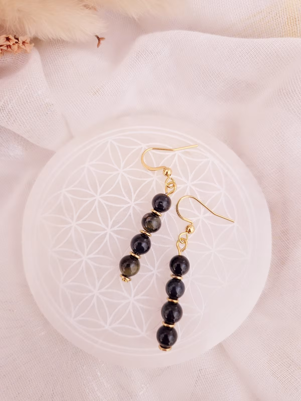 boucles d'oreilles oeil de faucon